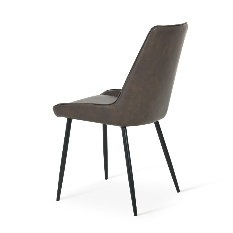 Cheap dining chairs styled with wooden table in small flat
Space saving dining chairs tucked under kitchen island | Value furniture
Modern budget dining chairs in family home setting