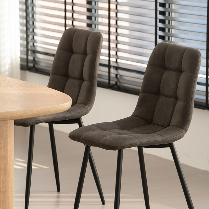 Modern budget dining chairs in family home setting