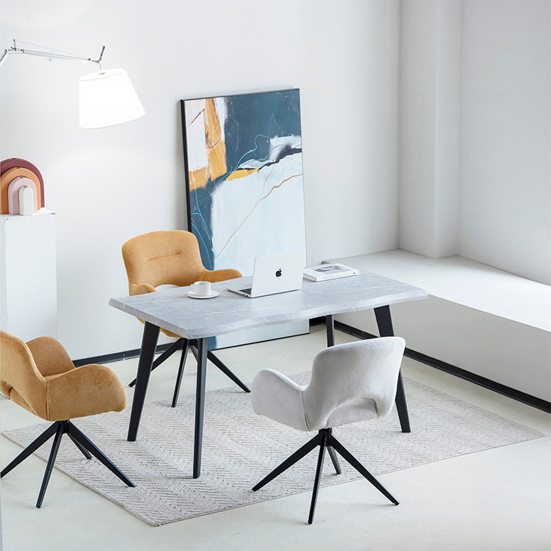 Add instant character to your UK home with the OFCASA Beatrix Dining Table. Featuring a warm wood grain melamine tabletop and sleek black metal legs, perfect for family meals or evening drinks.
Modern budget dining table in family home setting