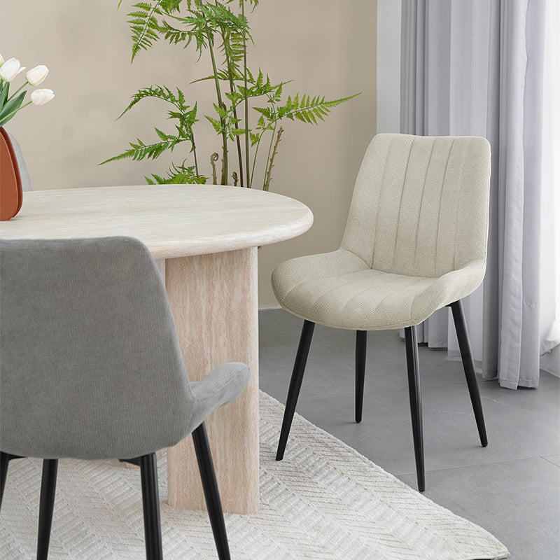 Affordable dining chairs in real UK home dining room | Budget decor
Cheap dining chairs styled with wooden table in small flat
Space saving dining chairs tucked under kitchen island | Value furniture
Modern budget dining chairs in family home setting