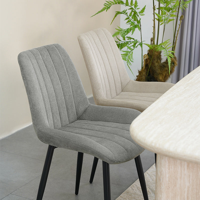 Affordable dining chairs in real UK home dining room | Budget decor
Cheap dining chairs styled with wooden table in small flat
Space saving dining chairs tucked under kitchen island | Value furniture
Modern budget dining chairs in family home setting
grey effect cheap dining chairs in bright kitchen diner