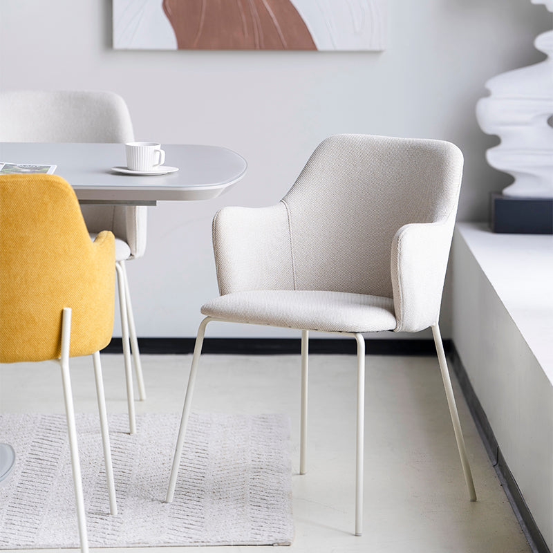 Affordable dining chairs in real UK home dining room | Budget decor
Cheap dining chairs styled with wooden table in small flat
Space saving dining chairs tucked under kitchen island | Value furniture
Modern budget dining chairs in family home setting
white effect cheap dining chairs in bright kitchen diner