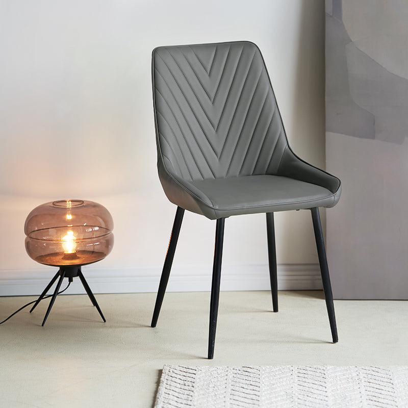 Modern budget dining chairs in family home setting
ofcasa, Zack V dining chairs, grey dining chairs, faux leather dining chairs, chairs for sale