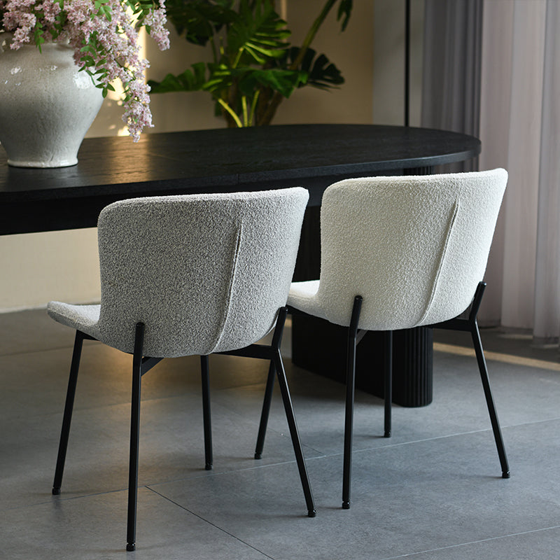 Affordable dining chairs in real UK home dining room | Budget decor
Cheap dining chairs styled with wooden table in small flat
Space saving dining chairs tucked under kitchen island | Value furniture
Modern budget dining chairs in family home setting