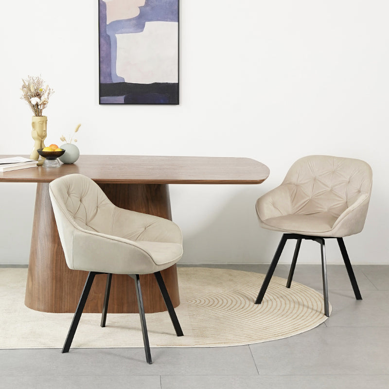 Beige OFCASA Aleena dining chair with cushioned high back and smooth PU leather upholstery, showcasing modern elegance for contemporary dining rooms.Close-up of OFCASA Aleena chair’s smooth PU leather and refined stitching, highlighting durability and a luxury finish.A warm dining scene featuring OFCASA Aleena chairs around a wooden table, ideal for family gatherings and stylish everyday meals.