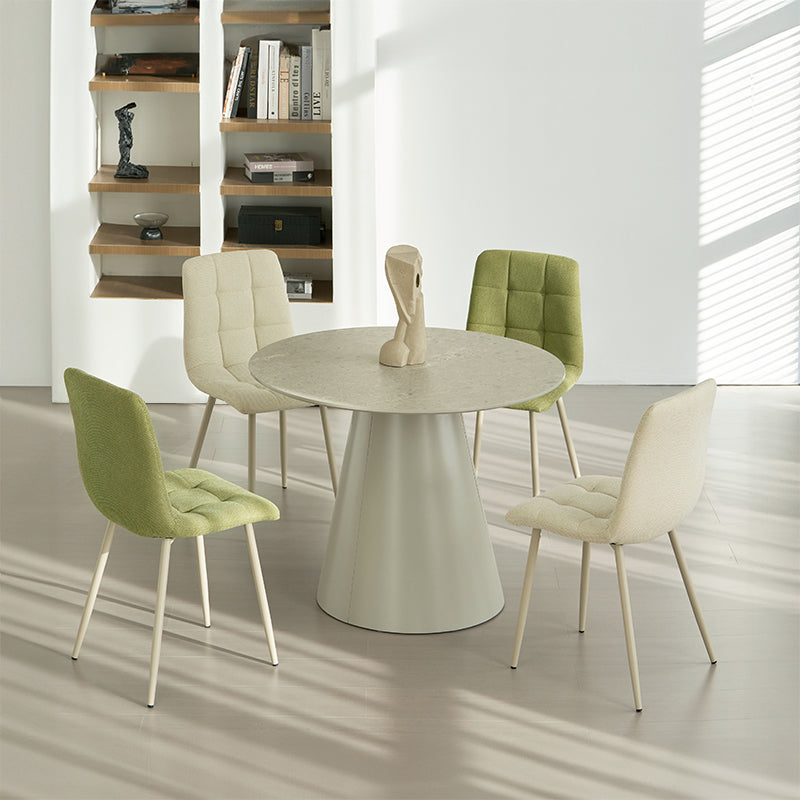 Experience comfort and style with Aoife Dining Chairs: linen blend upholstery, diamond grid stitching and slender metal legs for modern elegance.