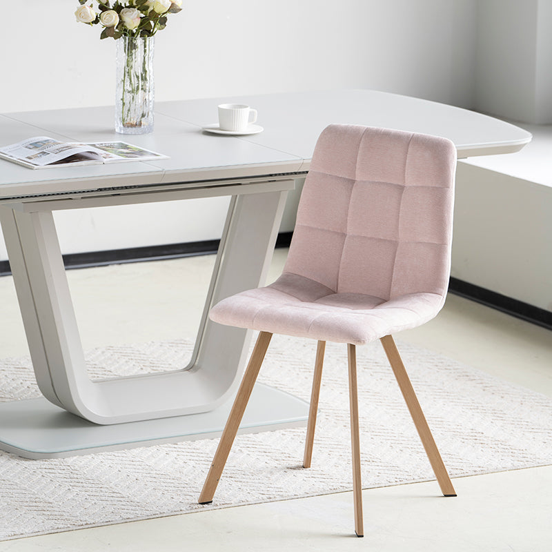 Refresh your dining space with the Aoife Sleek Chairs—quilted linen upholstery, oak-tone metal legs, and a slim profile for effortless modern style.