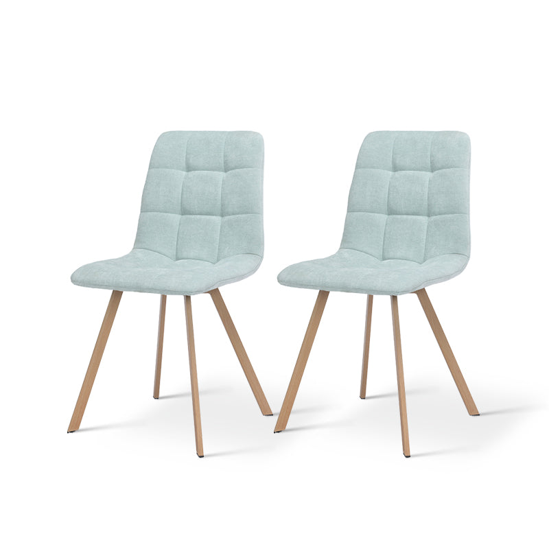 Refresh your dining space with the Aoife Sleek Chairs—quilted linen upholstery, oak-tone metal legs, and a slim profile for effortless modern style.