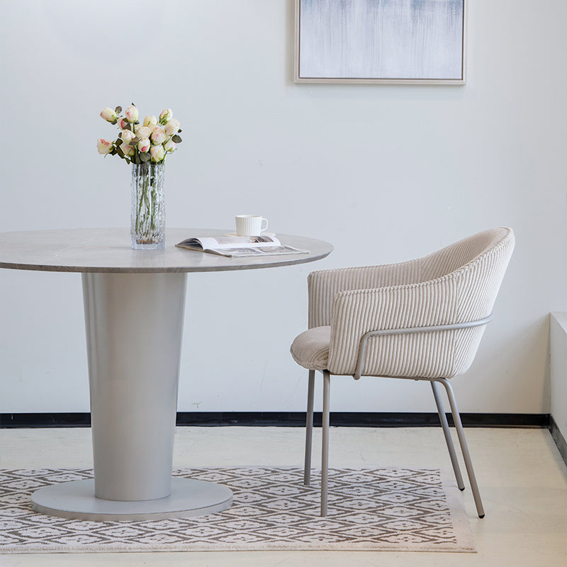 Dress your dining space in luxury with Beatrix Dining Chairs: plush corduroy velvet upholstery and gleaming gold legs for comfort and elegance.