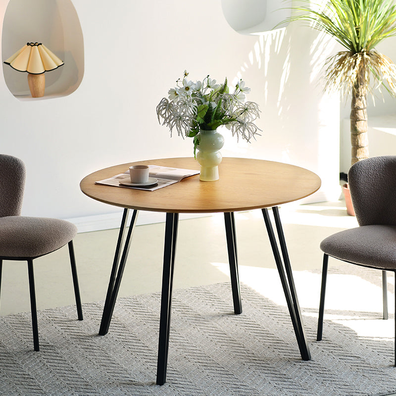 Add Scandi style warmth to UK homes with the OFCASA Fareeha 100 cm round table. Wood patterned melamine top, sleek black legs, durable and easy to clean.