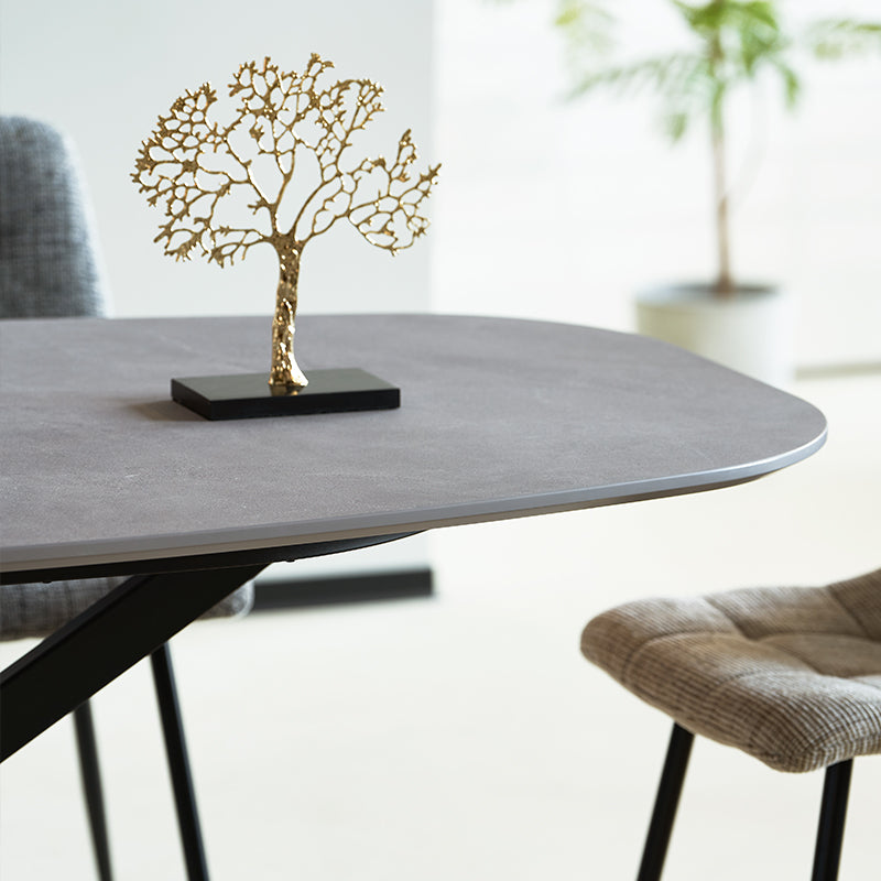 Discover the OFCASA Geena Ellipse Dining Table in grey marble melamine with black crossed metal legs. 180 cm seats six, durable & easy clean—ideal for modern UK dining.