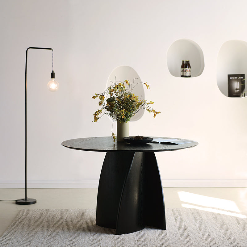 Upgrade your dining with the OFCASA Gemma 120 cm black round table – bold MDF top and wood veneer base for effortless modern style.