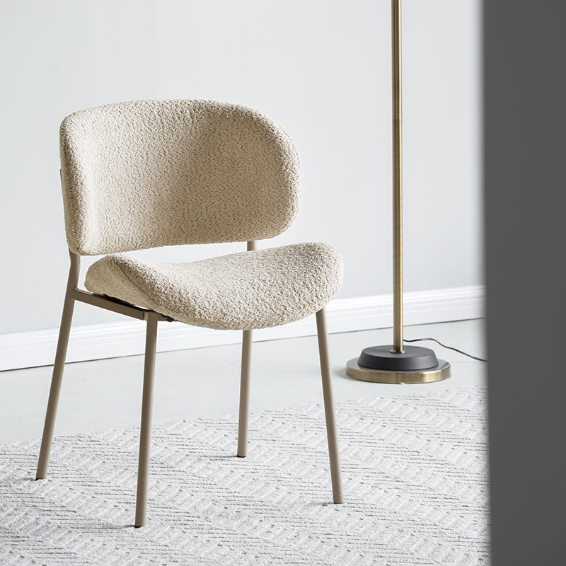 Upgrade your dining space with OFCASA Hadley Boucle Dining Chairs. Soft boucle fabric, wide-back support, and sturdy metal legs—perfect for cosy, stylish UK homes.