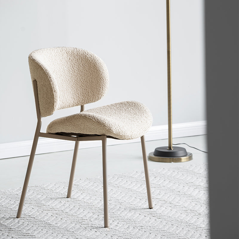 Upgrade your dining space with OFCASA Hadley Boucle Dining Chairs. Soft boucle fabric, wide-back support, and sturdy metal legs—perfect for cosy, stylish UK homes.