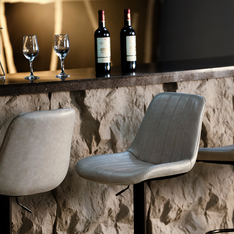 Discover OFCASA Jarvis AH Bar Stools: adjustable 62–82 cm hydraulic lift, 360° swivel, PU leather upholstery, and sturdy metal base—ideal for modern UK kitchens.
