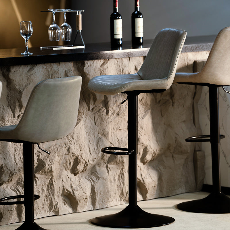 Discover OFCASA Jarvis AH Bar Stools: adjustable 62–82 cm hydraulic lift, 360° swivel, PU leather upholstery, and sturdy metal base—ideal for modern UK kitchens.
