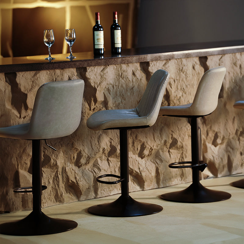 Discover OFCASA Jarvis AH Bar Stools: adjustable 62–82 cm hydraulic lift, 360° swivel, PU leather upholstery, and sturdy metal base—ideal for modern UK kitchens.
