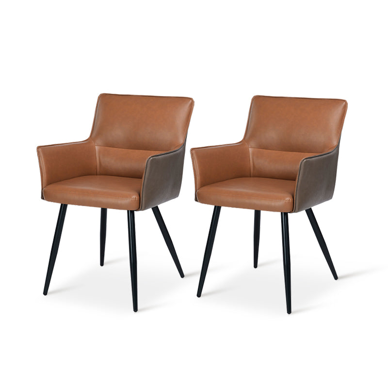 Elevate dining with Kaya’s PU leather armchairs featuring two tone patchwork upholstery, foam padded seat, and black steel legs for a modern, durable finish.