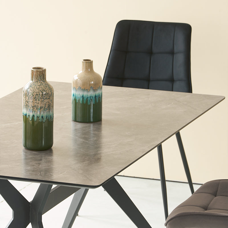 Create a sleek dining look with the Laila 240×90 cm marble pattern table and six Orozco velvet chairs on metal legs. Elegant and built to last.