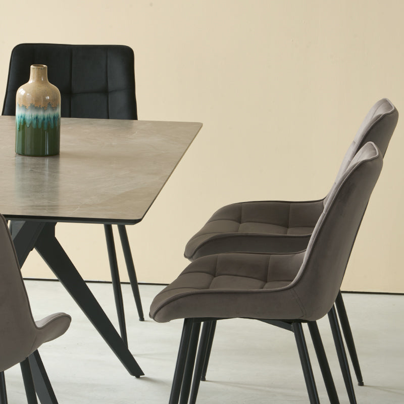 Create a sleek dining look with the Laila 240×90 cm marble pattern table and six Orozco velvet chairs on metal legs. Elegant and built to last.