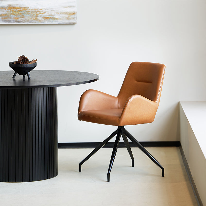 Enjoy effortless rotation and plush PU leather comfort with the OFCASA Liese Swivel Dining Chair. Ideal for modern UK dining rooms or cosy breakfast corners.