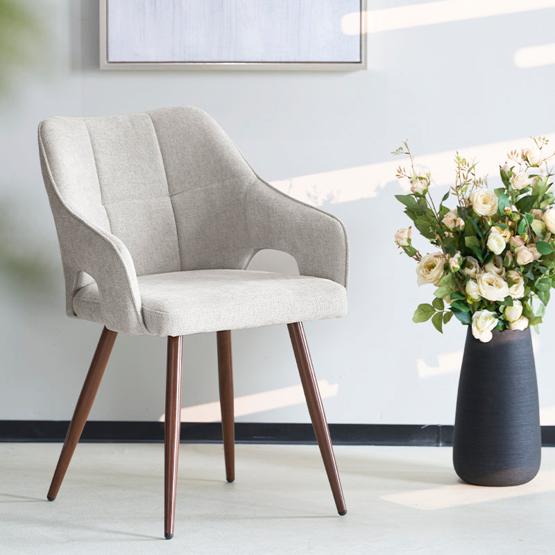 Discover the OFCASA Sage Dining Chairs: soft linen upholstery, wood effect walnut metal legs, and cozy armrests—perfect for stylish, durable UK dining settings.
