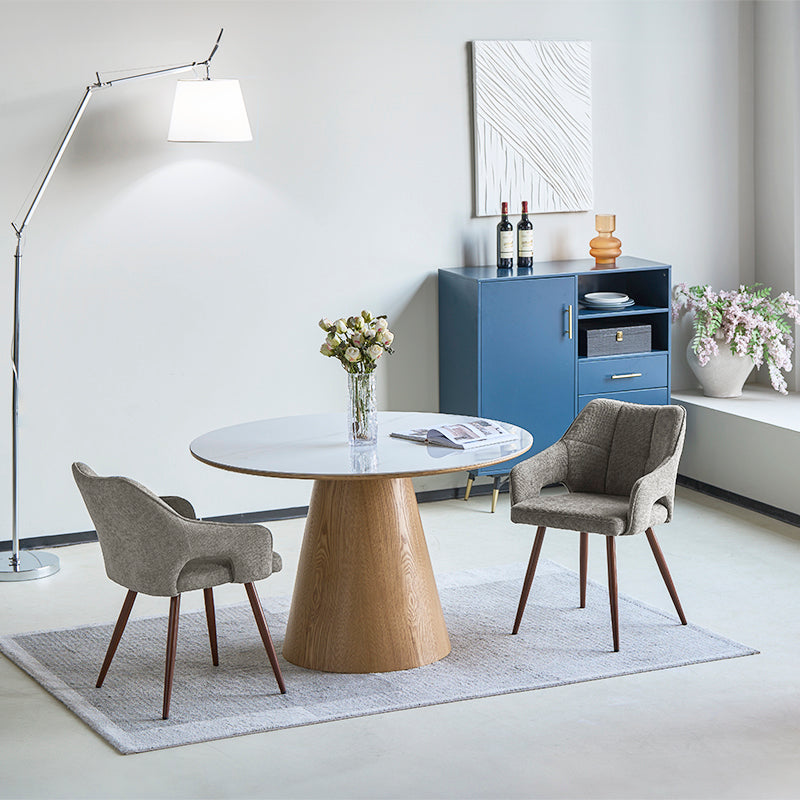 Discover the OFCASA Sage Dining Chairs: soft linen upholstery, wood effect walnut metal legs, and cozy armrests—perfect for stylish, durable UK dining settings.
