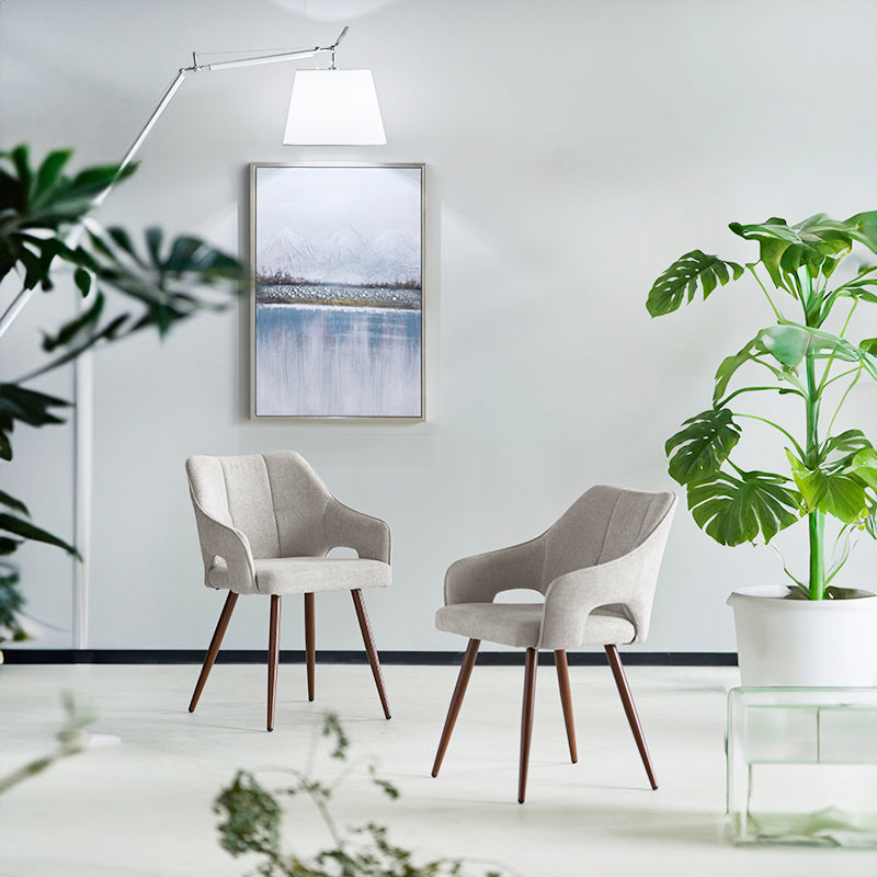 Discover the OFCASA Sage Dining Chairs: soft linen upholstery, wood effect walnut metal legs, and cozy armrests—perfect for stylish, durable UK dining settings.