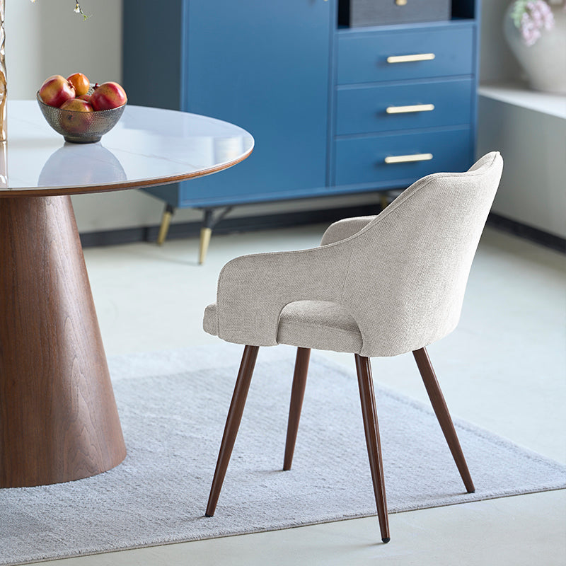 Discover the OFCASA Sage Dining Chairs: soft linen upholstery, wood effect walnut metal legs, and cozy armrests—perfect for stylish, durable UK dining settings.