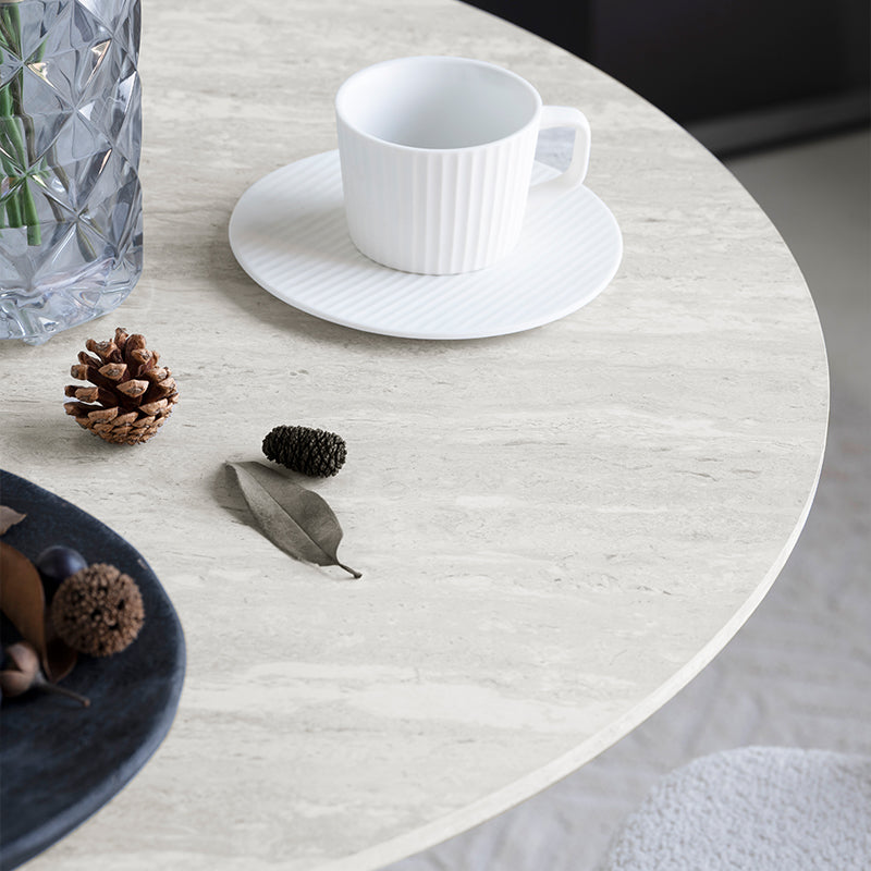 Bring boutique style to compact UK kitchens with the OFCASA Tiana 80 cm round dining table. Travertine effect top, sturdy black metal base, easy clean and simple to assemble.