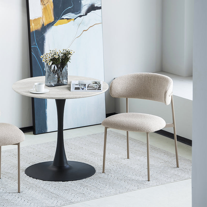 Bring boutique style to compact UK kitchens with the OFCASA Tiana 80 cm round dining table. Travertine effect top, sturdy black metal base, easy clean and simple to assemble.