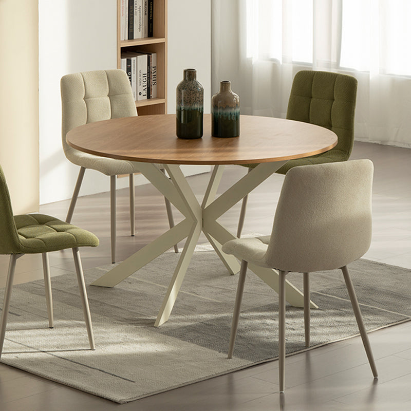 Discover the OFCASA Tilly Round Dining Table. 120 cm wood-effect melamine top, sturdy metal X-legs, and easy assembly—perfect for table and 4 dining chairs in modern UK homes.