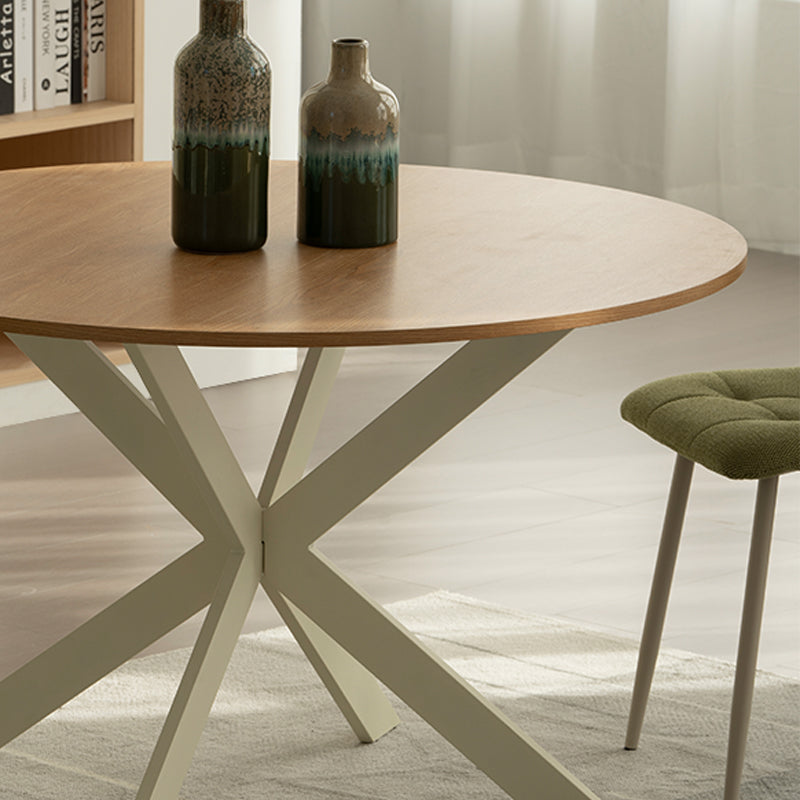 Discover the OFCASA Tilly Round Dining Table. 120 cm wood-effect melamine top, sturdy metal X-legs, and easy assembly—perfect for table and 4 dining chairs in modern UK homes.