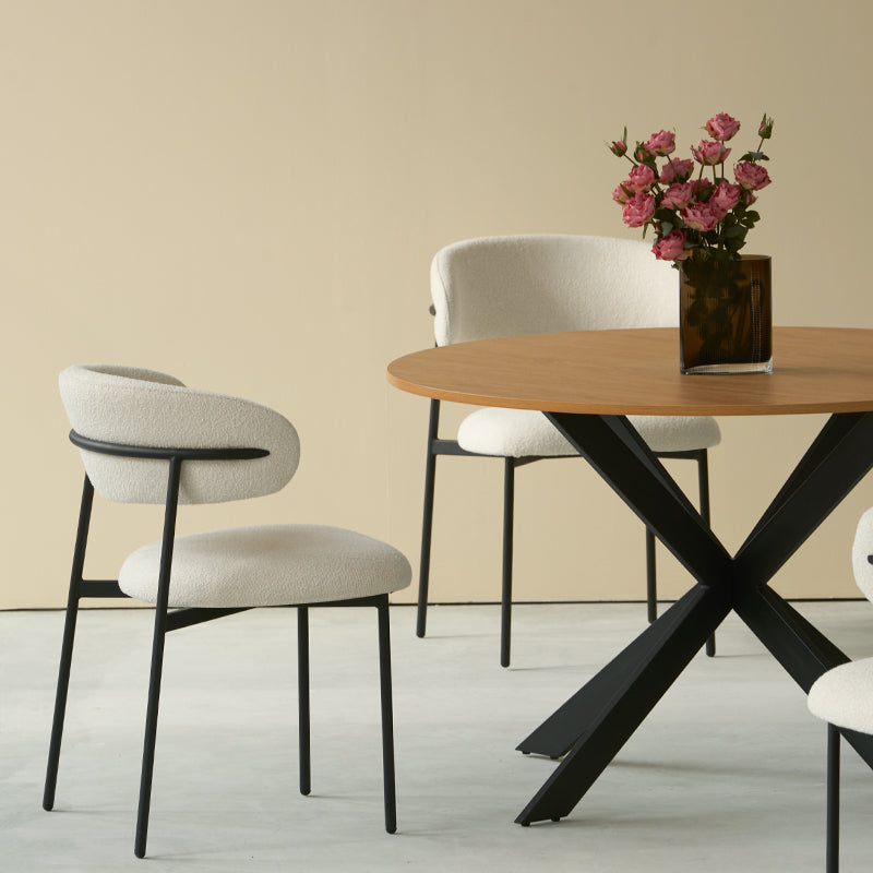 Discover the OFCASA Tilly Round Dining Table. 120 cm wood-effect melamine top, sturdy metal X-legs, and easy assembly—perfect for table and 4 dining chairs in modern UK homes.