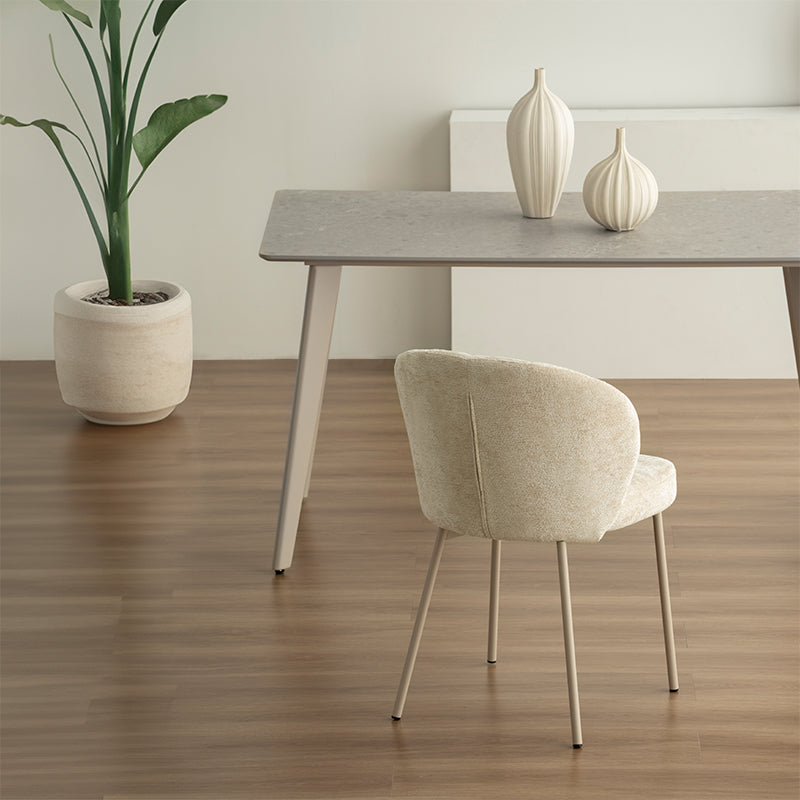 Discover the OFCASA Valdez Dining Table: 140 cm grey marble–effect top, sturdy black metal legs, and easy assembly. Perfect for modern UK dining spaces.