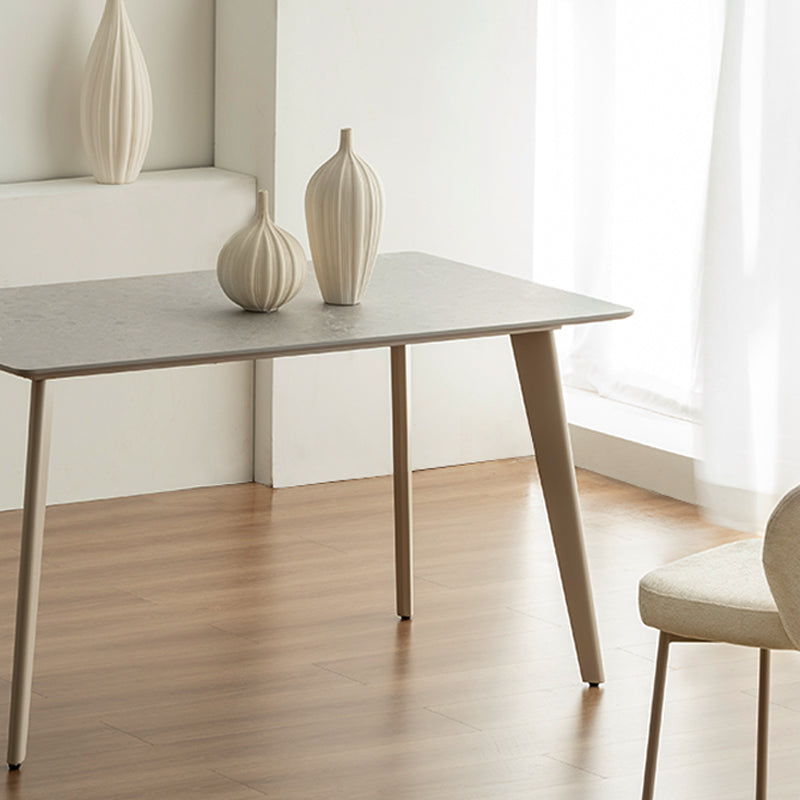 Discover the OFCASA Valdez Dining Table: 140 cm grey marble–effect top, sturdy black metal legs, and easy assembly. Perfect for modern UK dining spaces.