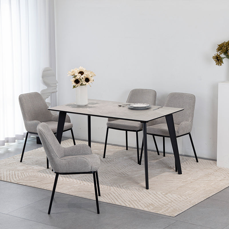 Discover the OFCASA Valdez Dining Table: 140 cm grey marble–effect top, sturdy black metal legs, and easy assembly. Perfect for modern UK dining spaces.