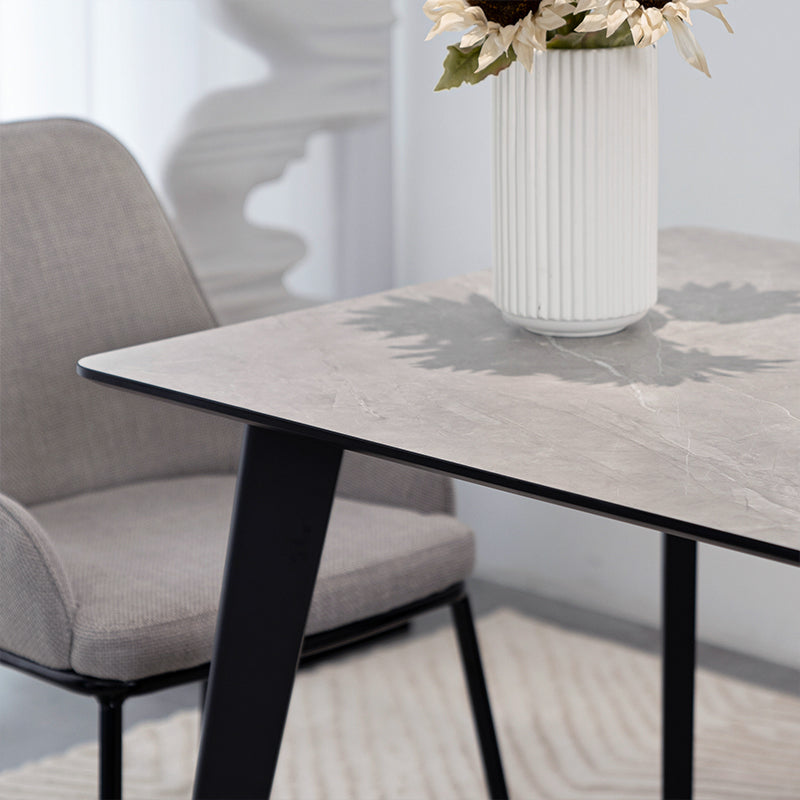 Discover the OFCASA Valdez Dining Table: 140 cm grey marble–effect top, sturdy black metal legs, and easy assembly. Perfect for modern UK dining spaces.