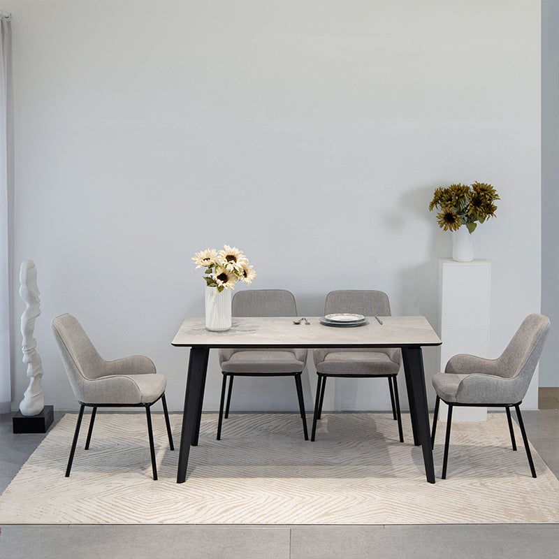 Discover the OFCASA Valdez Dining Table: 140 cm grey marble–effect top, sturdy black metal legs, and easy assembly. Perfect for modern UK dining spaces.