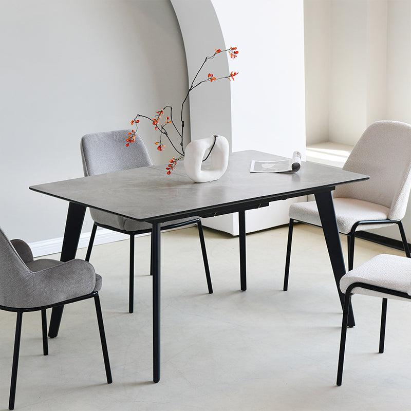 Host family dinners or work from home with the OFCASA Valdez X extendable table—grey marble effect top and sturdy black metal legs for timeless style.