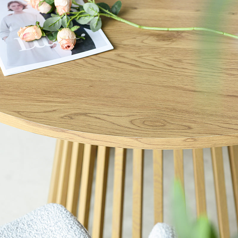 Discover the OFCASA Veronica 120 cm Round Dining Table with oak-effect top and sculptural metal base. Ideal for table and 4 dining chairs in modern UK homes.