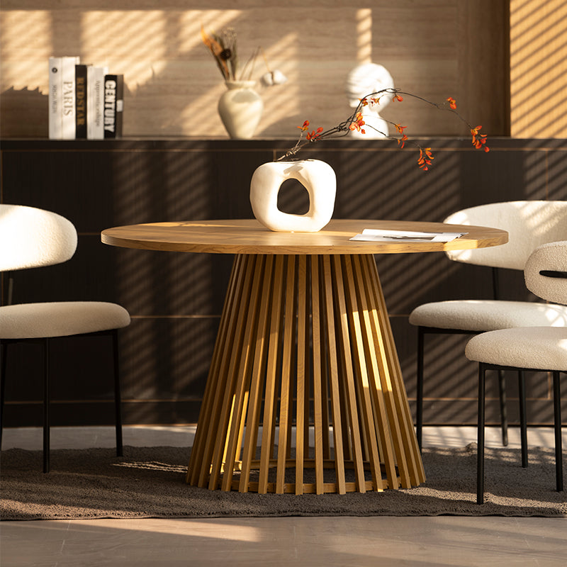 Discover the OFCASA Veronica 120 cm Round Dining Table with oak-effect top and sculptural metal base. Ideal for table and 4 dining chairs in modern UK homes.