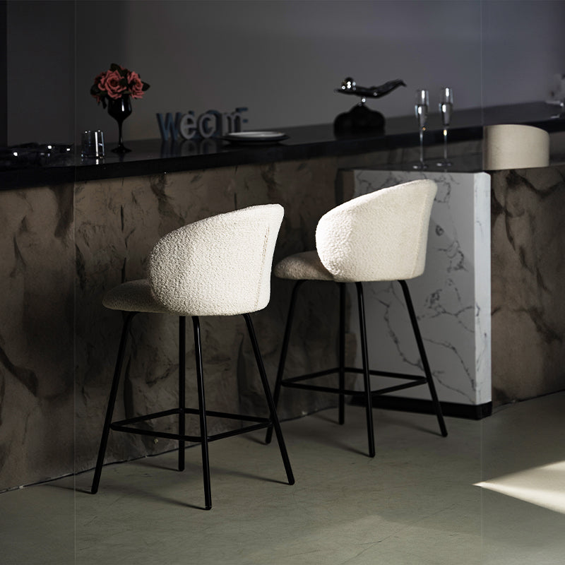 Upgrade your kitchen island with OFCASA Yasin Boucle Bar Stools. Plush boucle upholstery and sturdy metal frame for cosy, stylish UK seating.