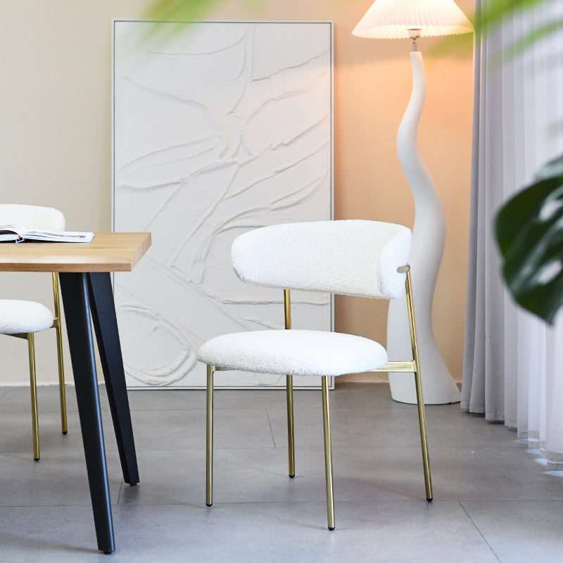 Elevate your UK dining space with OFCASA Zahra X chairs: boucle upholstered, divided wide back, and glam golden chrome legs. Set of 2 for instant style and comfort.