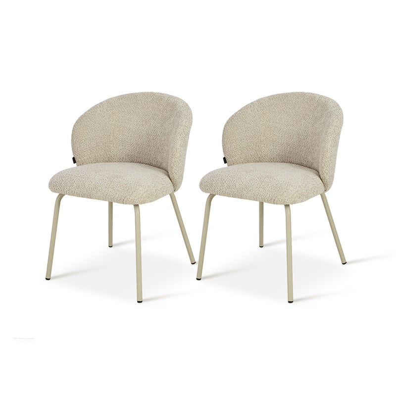 A set of two Yasin dining chairs with boucle fabric upholstery in beige color, placed in a modern dining room setting with a white round dining table.