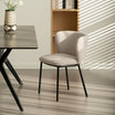 Set of 2 Karin dining chairs with curved wooden legs and boucle, mid-century modern design for kitchen or dining room – OFCASA premium furniture collection.Modern budget dining chairs in family home setting Space saving dining chairs tucked under kitchen island | Value furniture