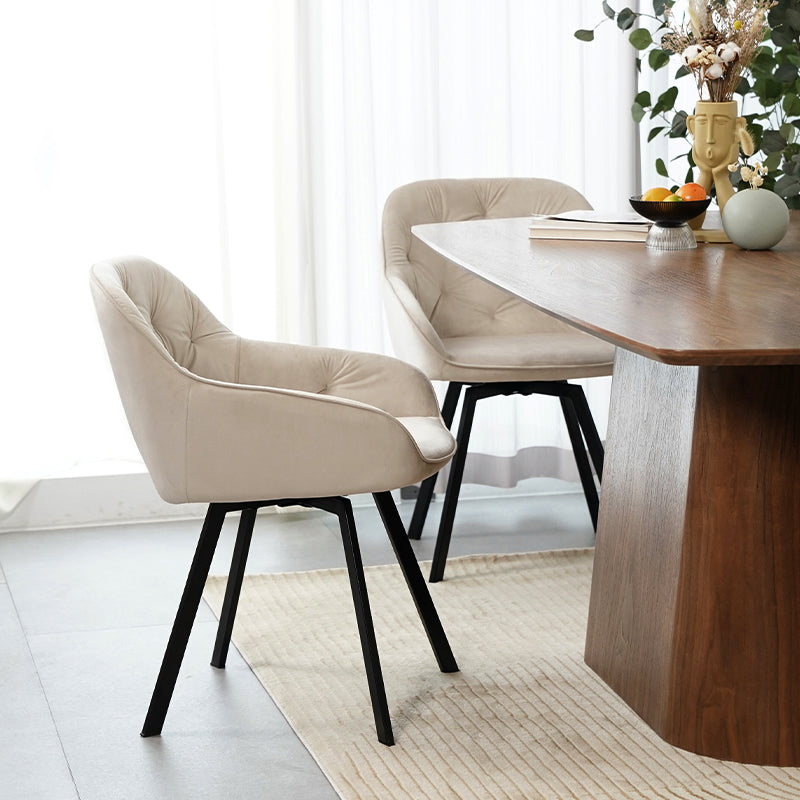 Beige OFCASA Aleena dining chair with cushioned high back and smooth PU leather upholstery, showcasing modern elegance for contemporary dining rooms.Close-up of OFCASA Aleena chair’s smooth PU leather and refined stitching, highlighting durability and a luxury finish.A warm dining scene featuring OFCASA Aleena chairs around a wooden table, ideal for family gatherings and stylish everyday meals.