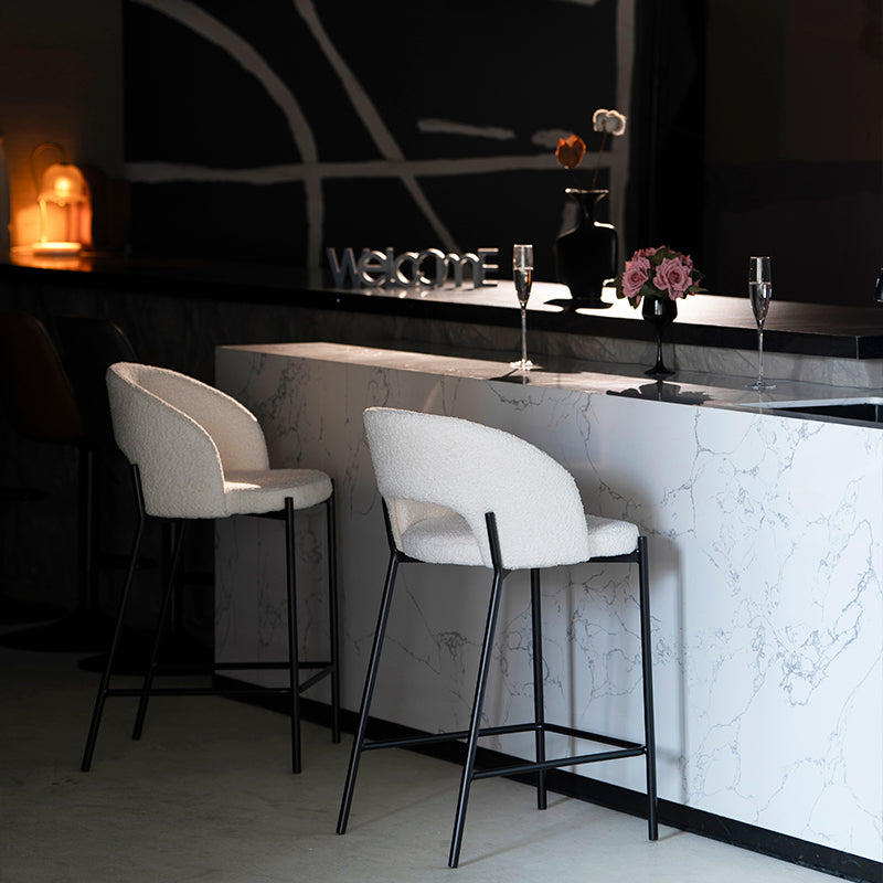 Kick back in style with OFCASA Esme bar stools—soft boucle seats and slim metal frames create chic, comfy seating for your kitchen island or breakfast bar.
