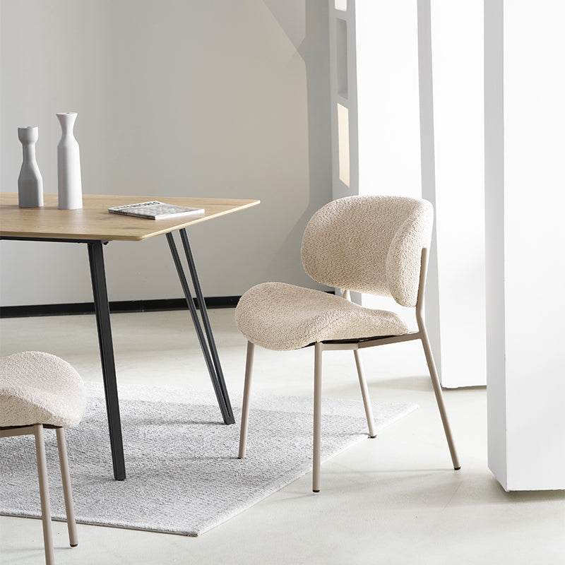 Upgrade your dining space with OFCASA Hadley Boucle Dining Chairs. Soft boucle fabric, wide-back support, and sturdy metal legs—perfect for cosy, stylish UK homes.