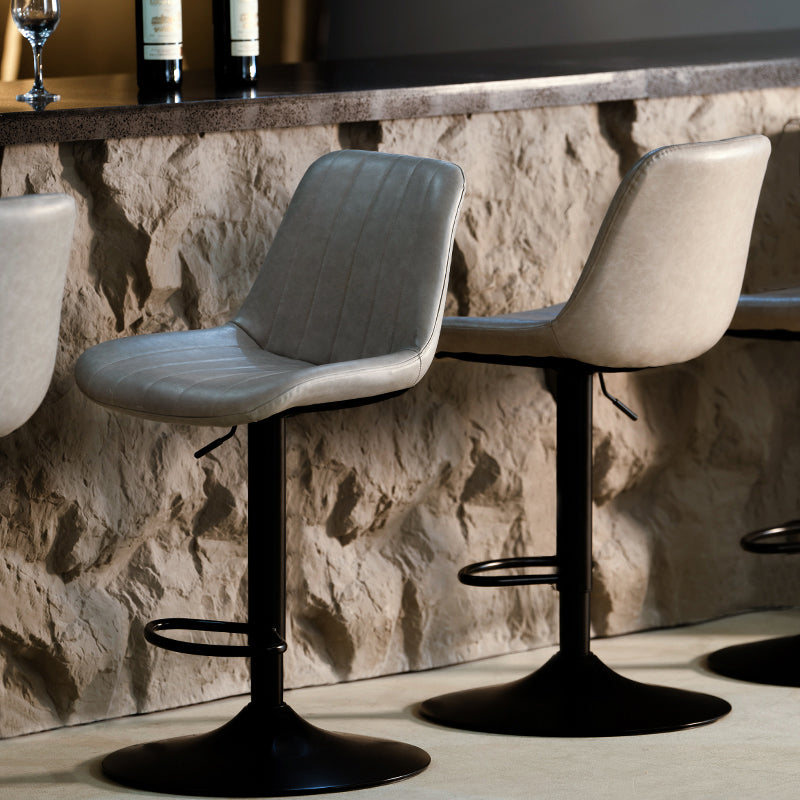 Discover OFCASA Jarvis AH Bar Stools: adjustable 62–82 cm hydraulic lift, 360° swivel, PU leather upholstery, and sturdy metal base—ideal for modern UK kitchens.